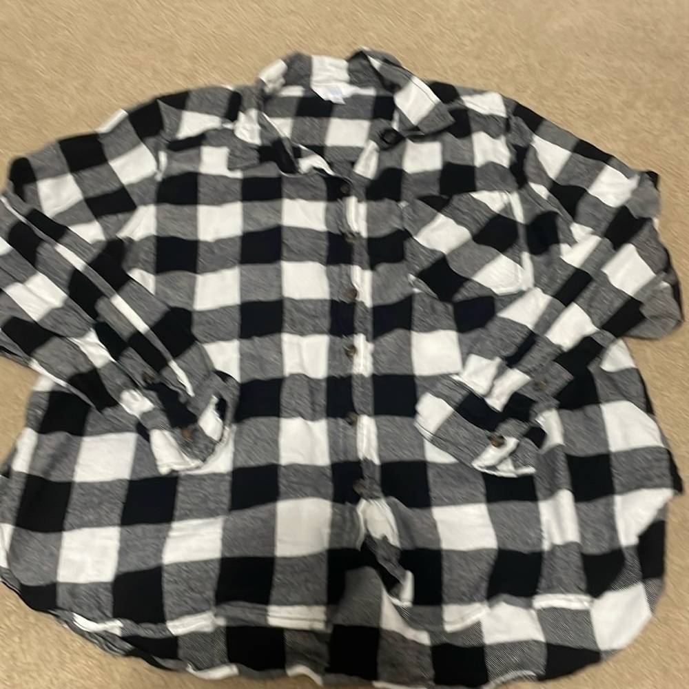 Black and white plaid flannel button down.